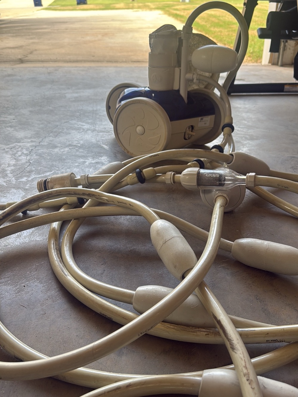 Polaris In ground  Pool pressure cleaner and Hoses in Cream and Blue